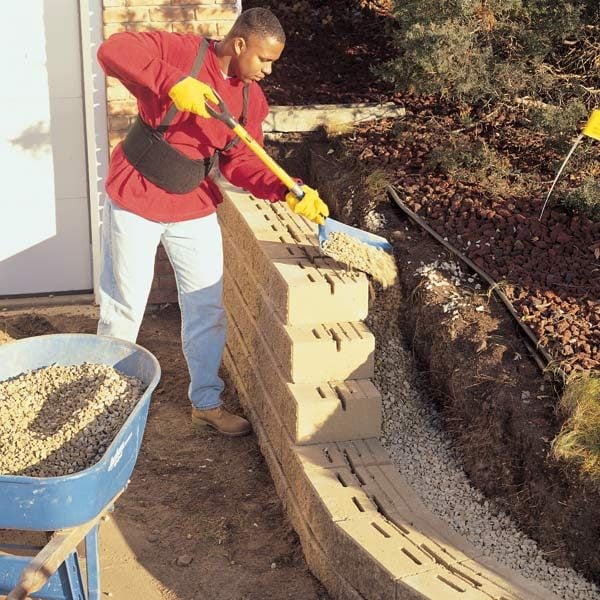 How to Build a Concrete Block Retaining Wall | The Family Handyman