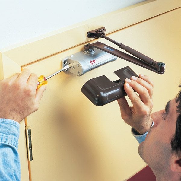 SelfClosing Door Making an Existing Garage Service Door Automatic The Family Handyman
