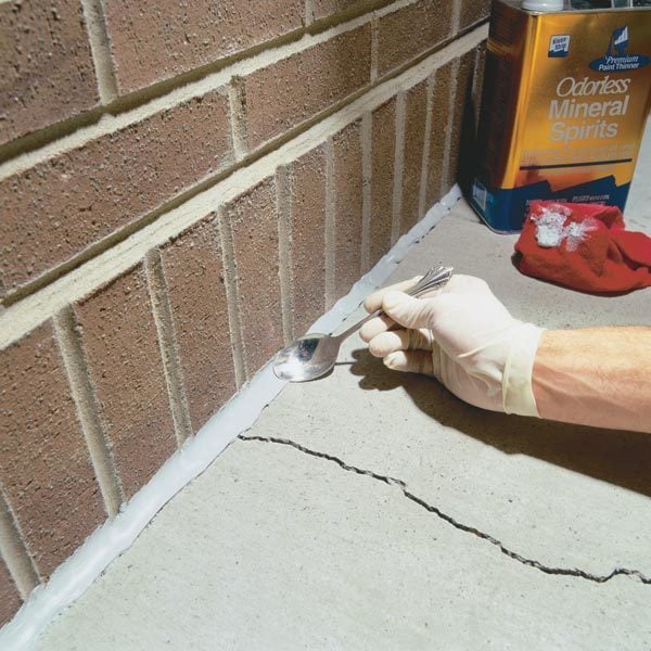 concrete caulking caulk cracking walks urethane gaps masonry joints eroding handyman backer