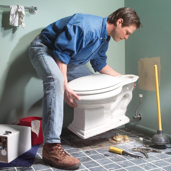 how to repair a leaking toilet the family handyman