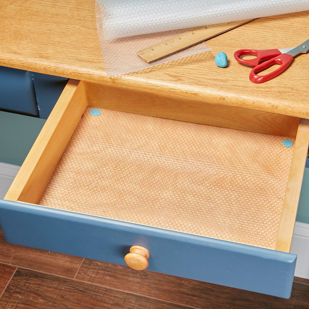 How to Line Drawers and Cabinets with Shelf Liner | The 