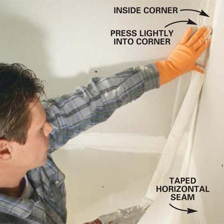 What are some good techniques for taping a drywall corner?