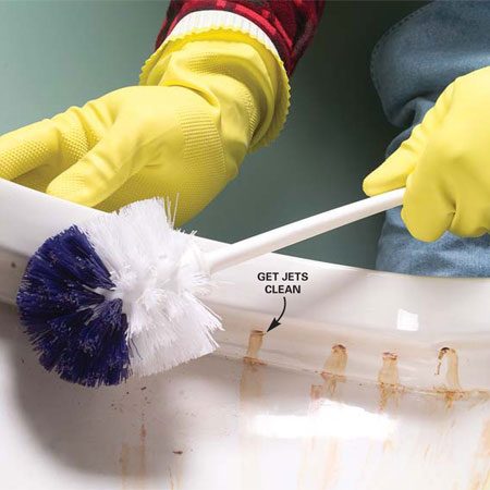How do you clean a badly stained toilet bowl?