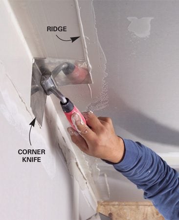 What are some good techniques for taping a drywall corner?