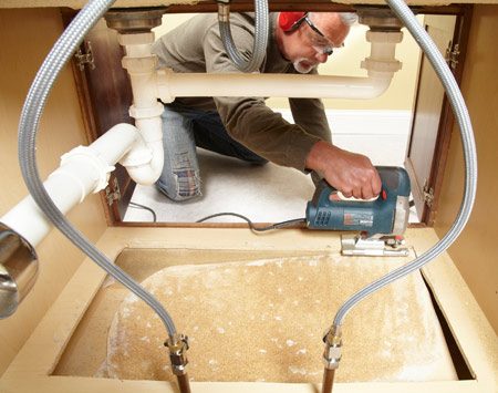 How to Replace a Sink Base Cabinet Floor | The Family Handyman