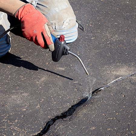 how to fill cracks in driveway