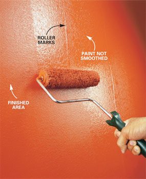 Paint roller on the wall
