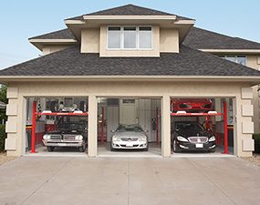 Five cars in a three car garage