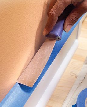 Avoid paint drips with masking tape