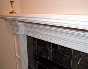 Marble and wood mantel and surround