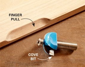 DIY Furniture Trick: Routed finger pulls made with cove bit.