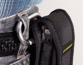 Clip attaches a belt sheath to the pants loop