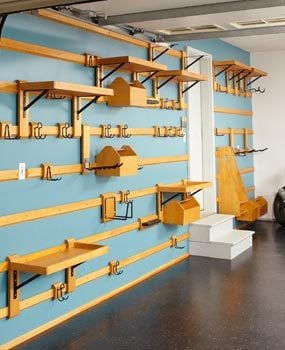 Customizable garage storage system wall wood strips and hangers