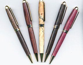 Pens with grips made of wood