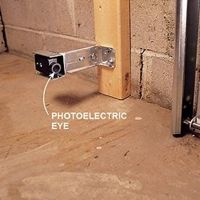 When you install a garage door, make sure it's controlled by a photoelectric eye.