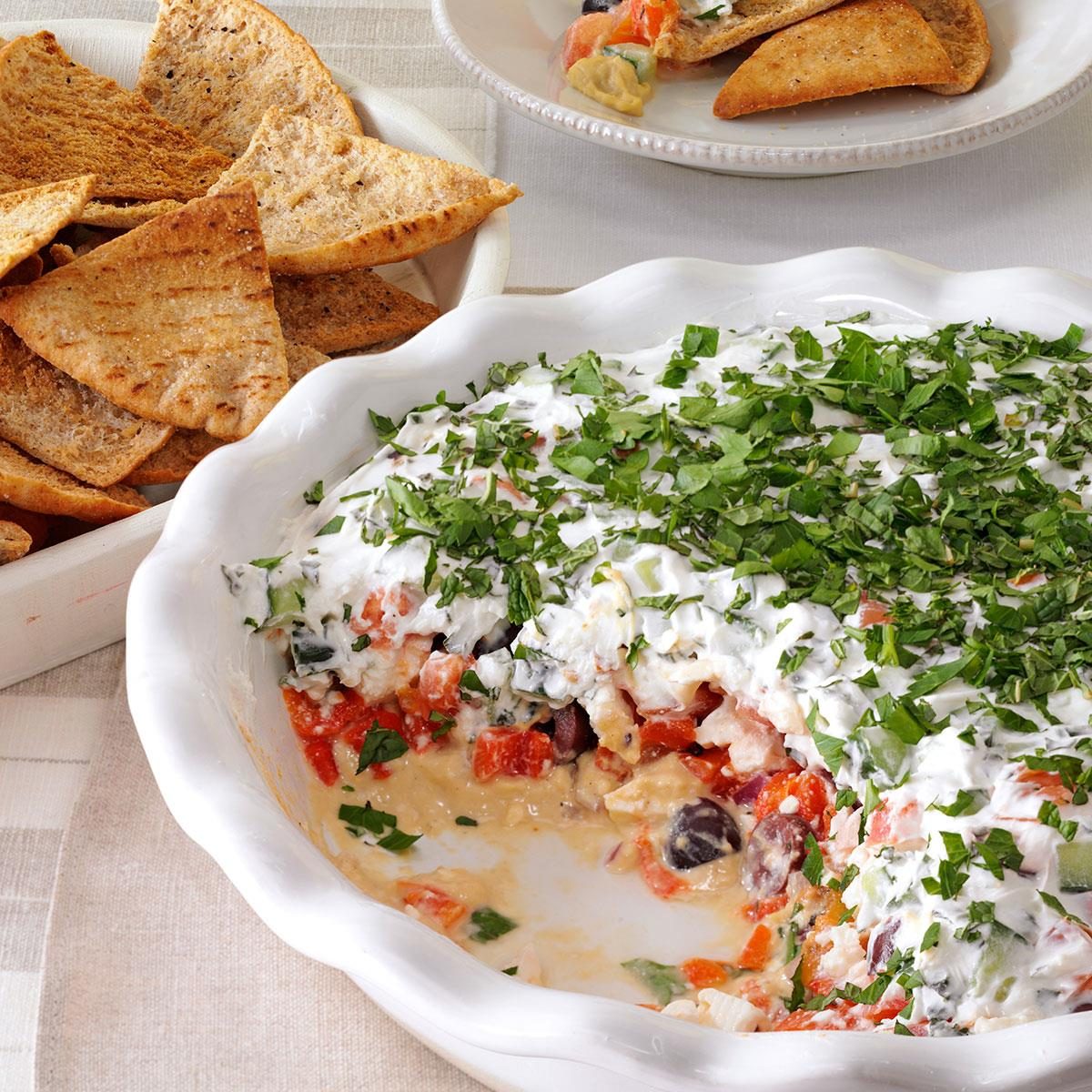 Layered Mediterranean Dip with Pita Chips Recipe | Taste of Home