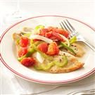 Savory Tomato-Braised Tilapia Recipe | Taste of Home