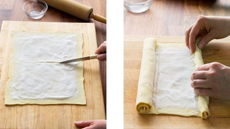 person using a knife to score down the middle of the sugared dough and then rolling the dough up from both ends so they meet in the middle